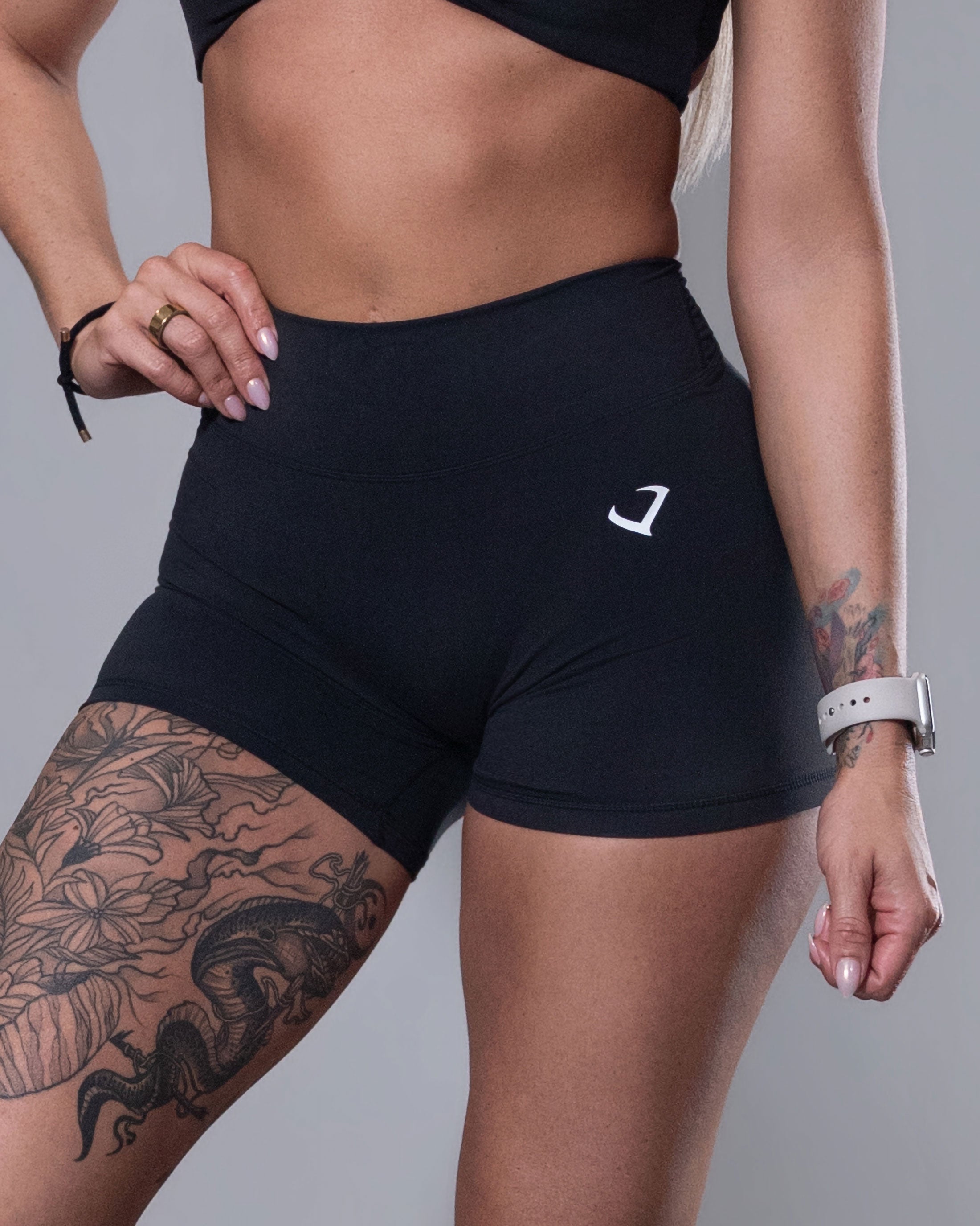 Allure V-Back Shorts in black, front detail of high-waisted fit