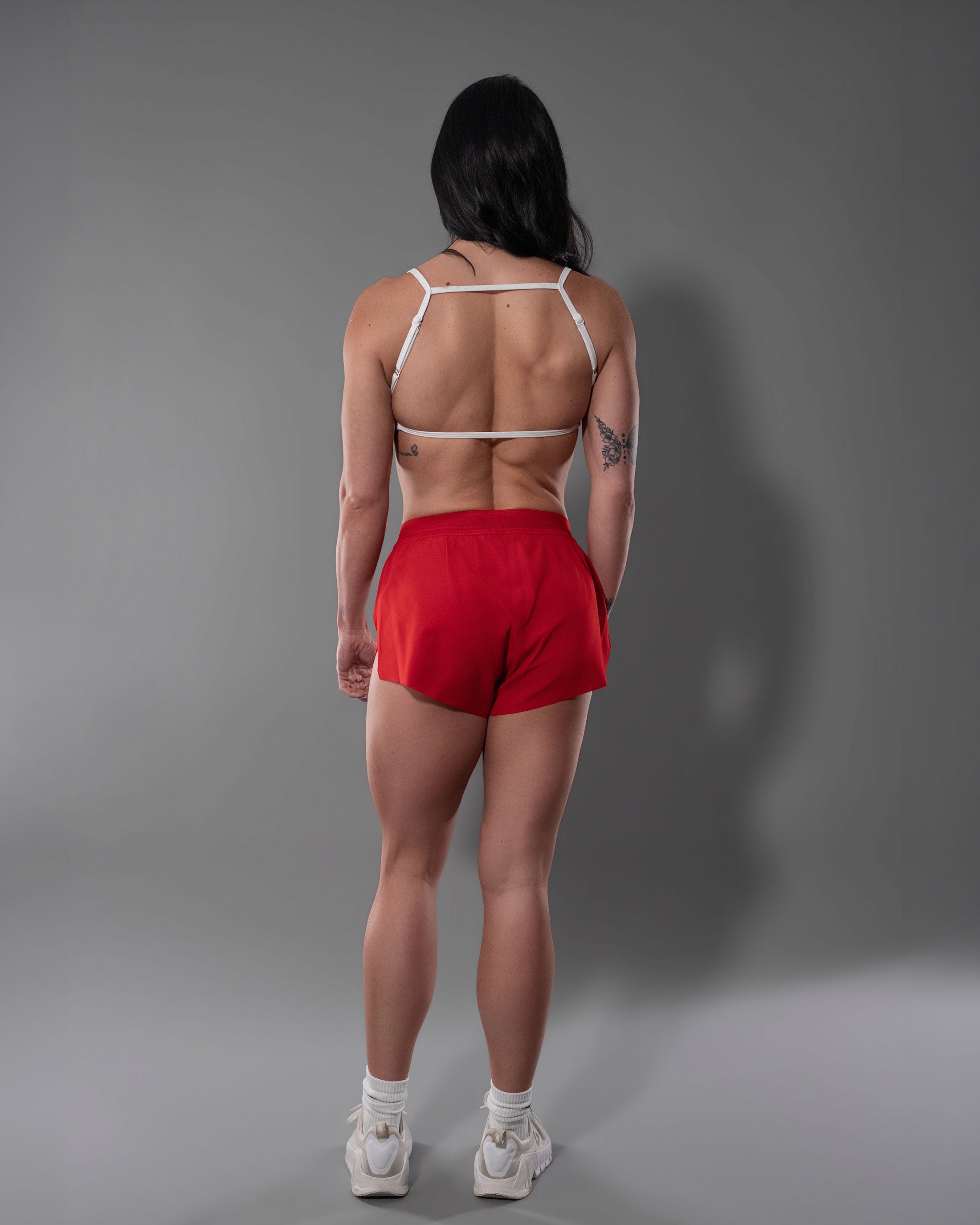 Red Gym Crush Shorts with a textured micro mesh side panel