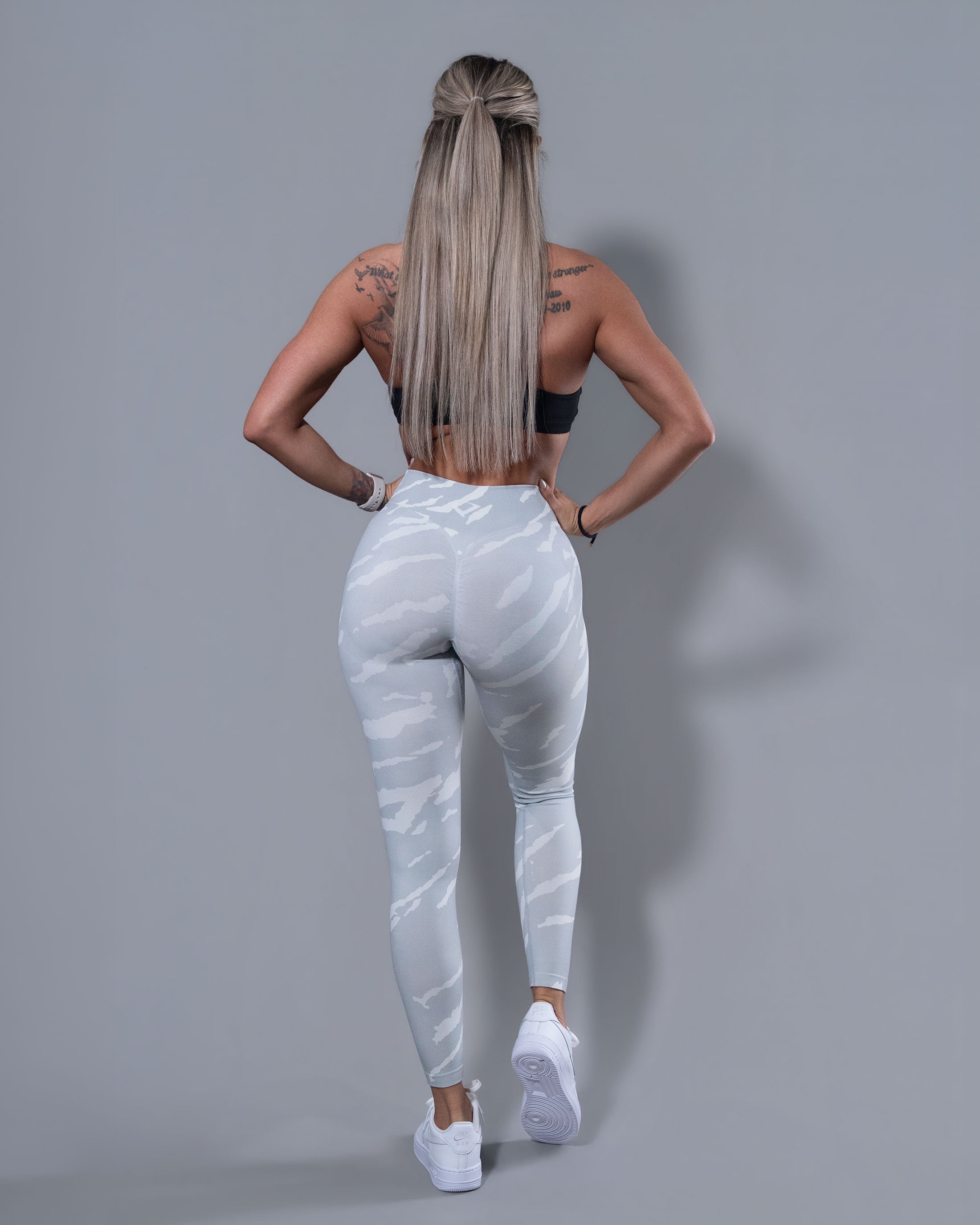 Close-up of Snow Storm white and gray leggings showing the scrunch butt glute lift