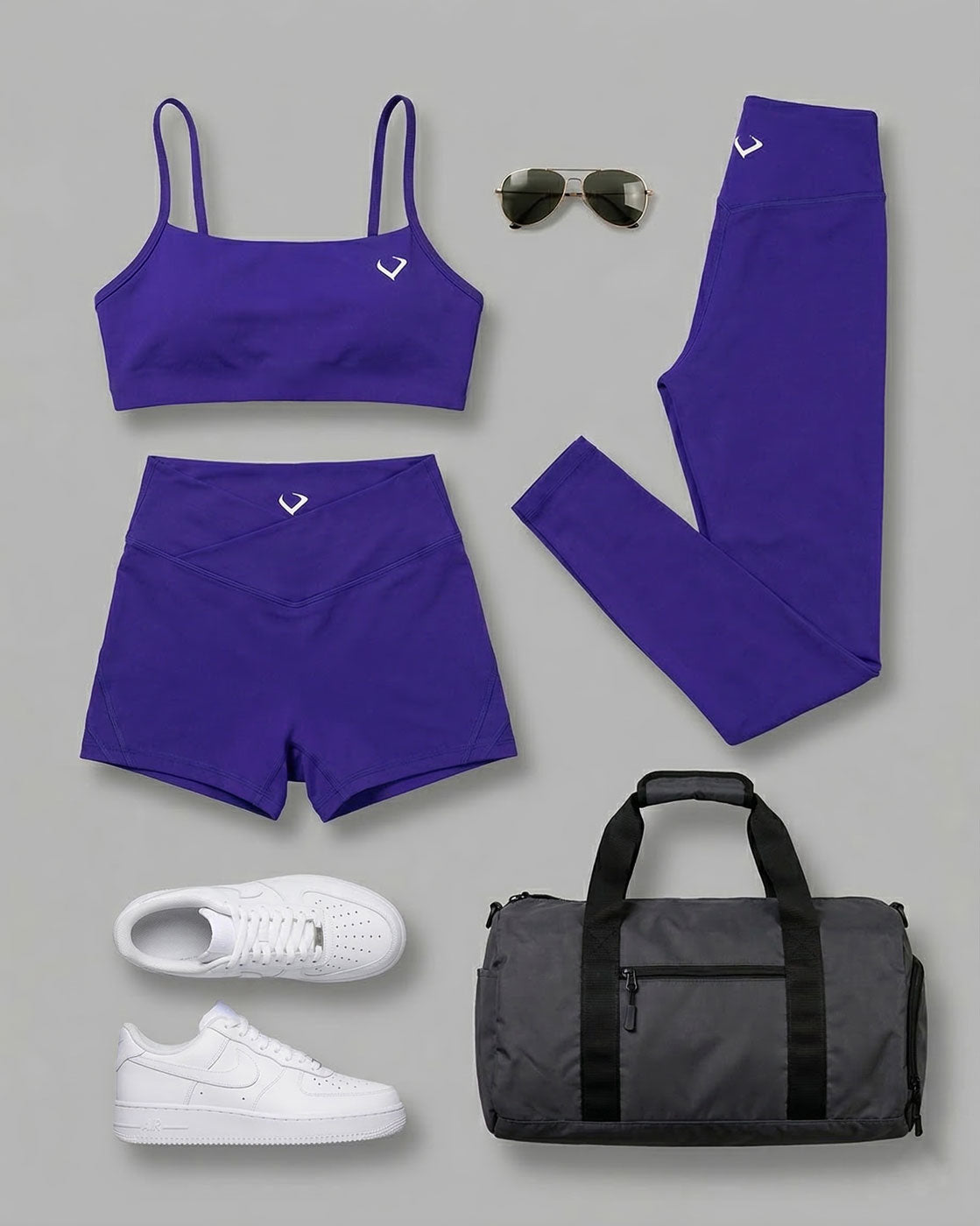 Product image, fitness clothing capsule featuring desire purple leggings, shorts and baddie bra.