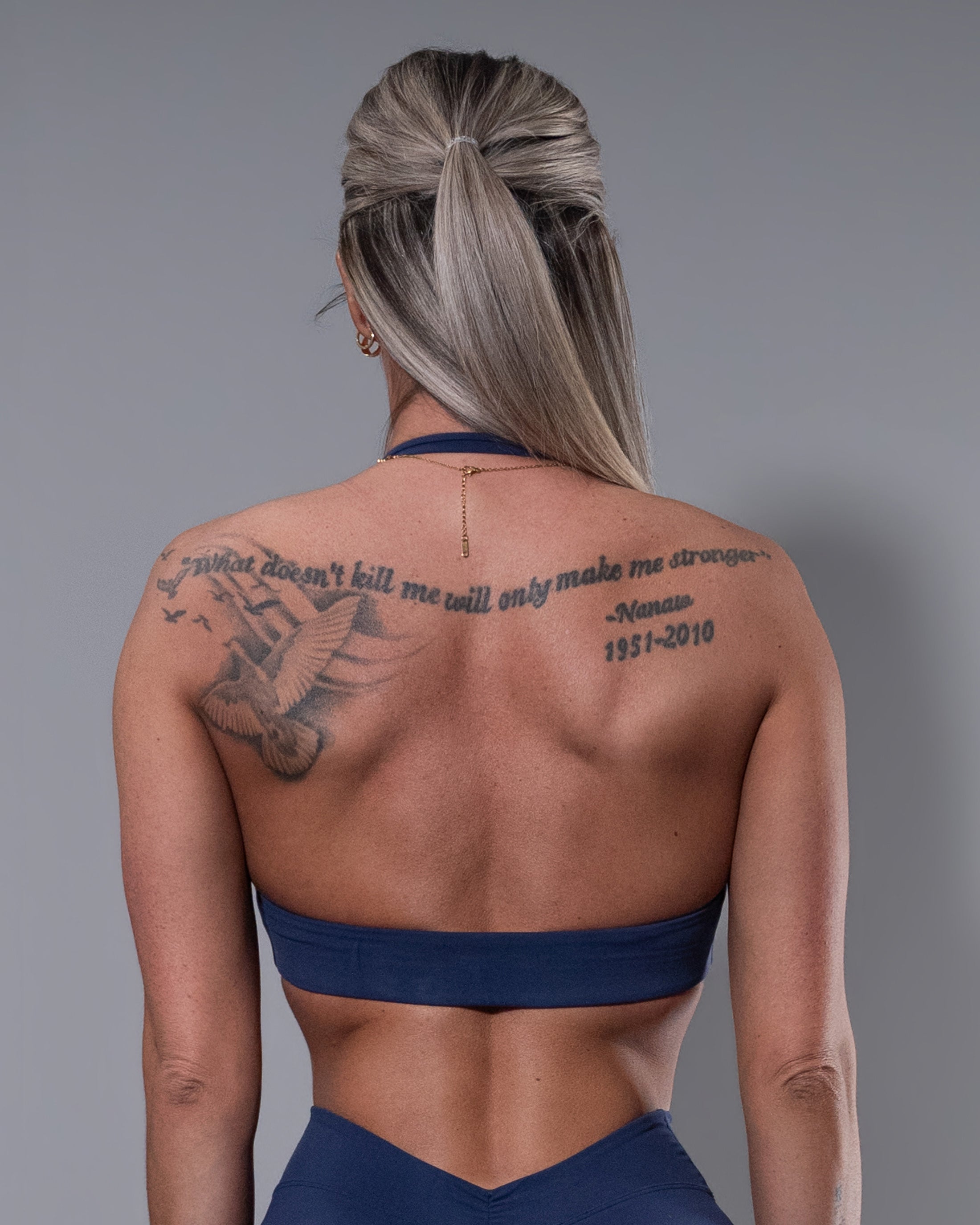 Allure Halter Sports Bra in navy, back view detail