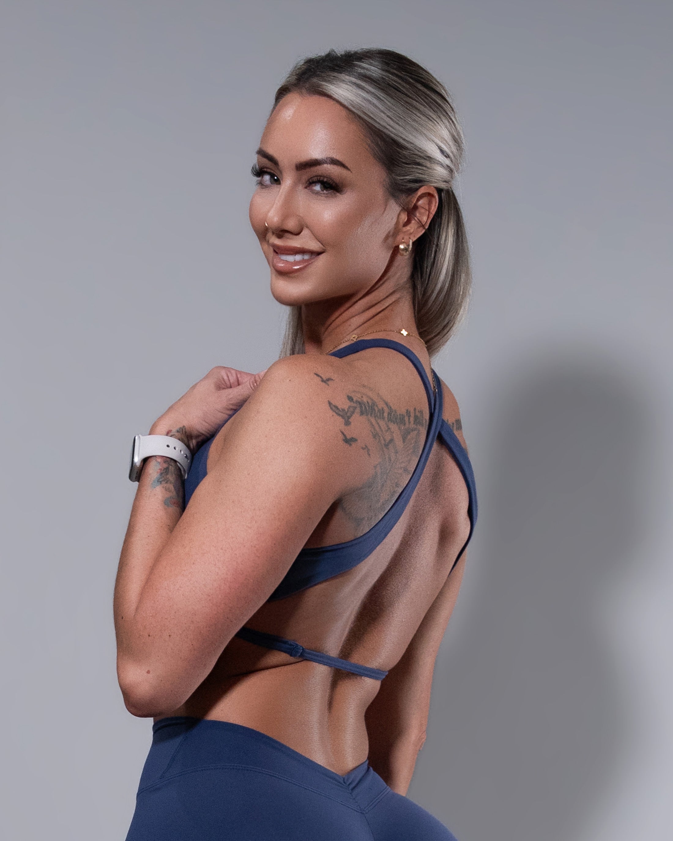 Allure Crossfire Sports Bra in navy, side view