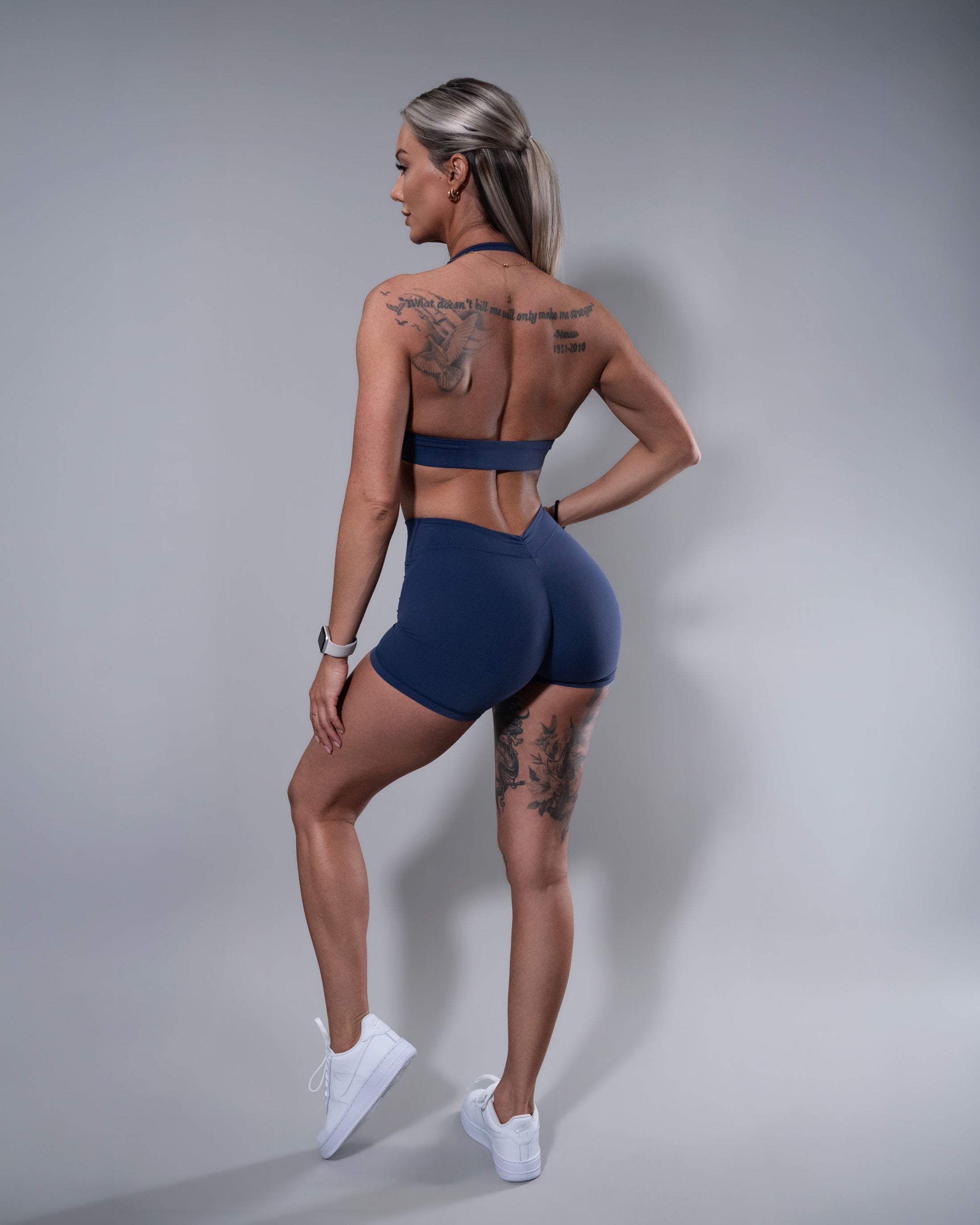 Allure V-Back Shorts in navy, side-back angle of scrunch butt design