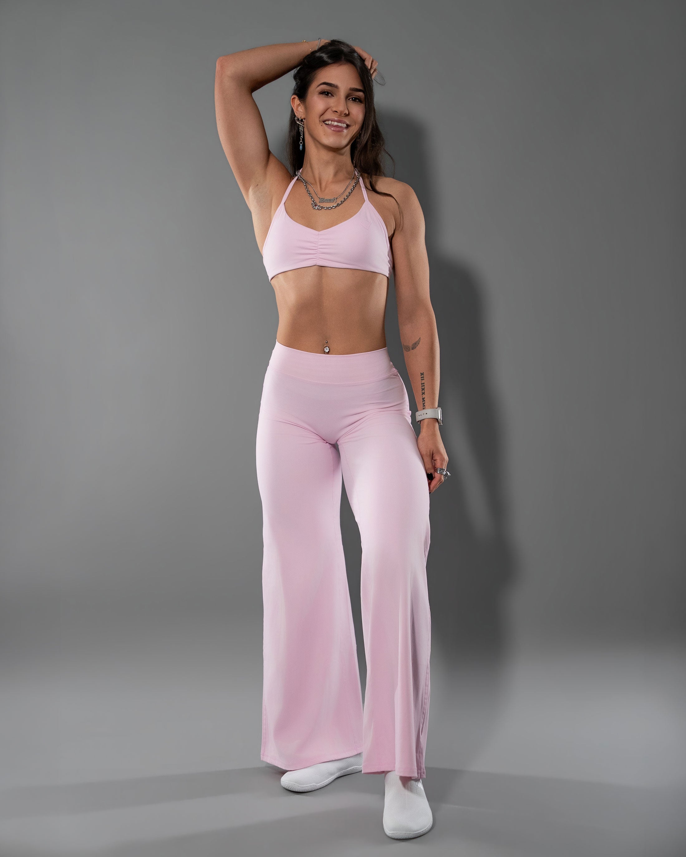 Tempt Flares and matching Tempt Halter in Soft Pink worn as a full set, front view